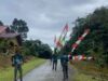 Sambut Hari Kemerdekaan RI, Personil Pos Kokas bersama Warga Pasang Bendera Merah Putih di Sepanjang Jalan Utama IMG-20250803-WA0152_copy_790x1177